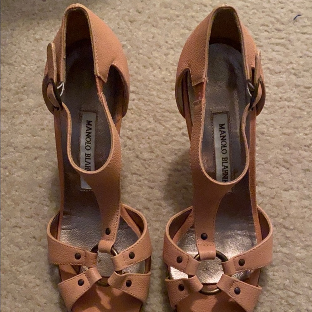 Manolo Blahnik, used but in good shape.